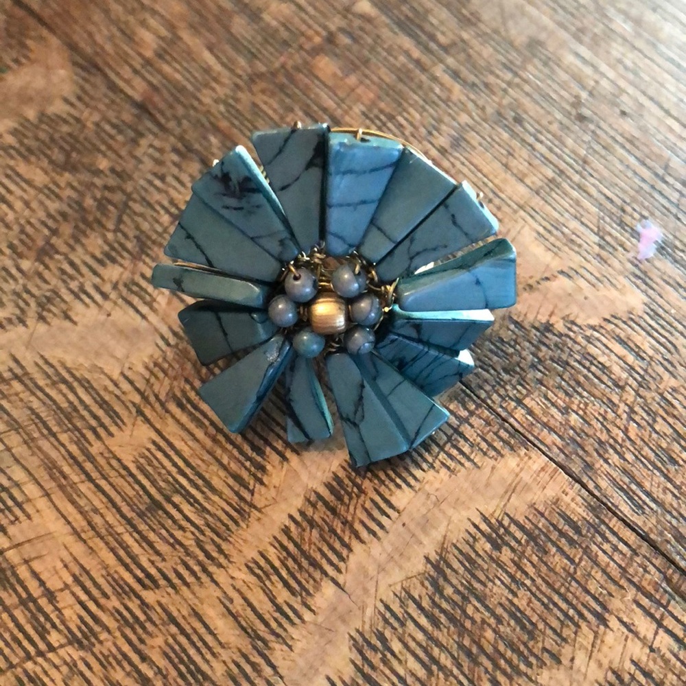 Wire wrapped green stone flower ring